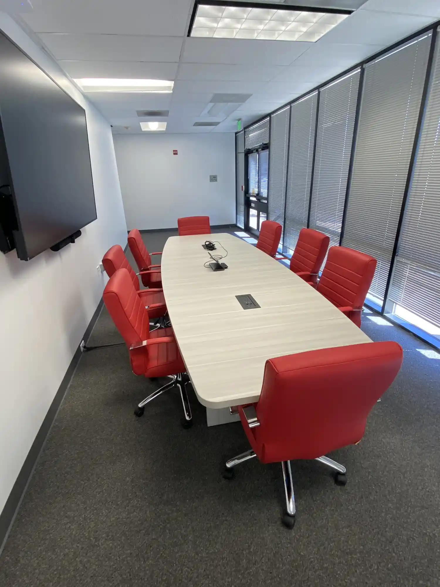 Conference Table with red chairs