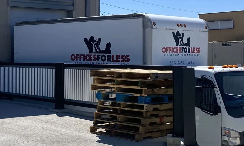 Office furniture delivery truck with pallets Denver Colorado
